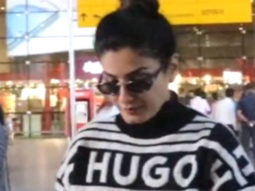 Raveena Tandon greets paps at the airport