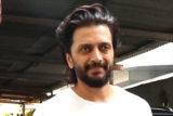 Riteish Deshmukh gets clicked by paps in a plain white tshirt