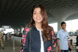 Shriya Saran poses for paps sporting a casual look at the airport