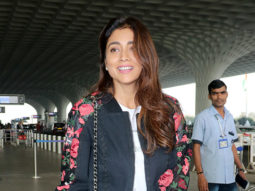 Shriya Saran poses for paps sporting a casual look at the airport