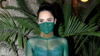 Uorfi Javed poses for paps wearing a bold see-through net outfit