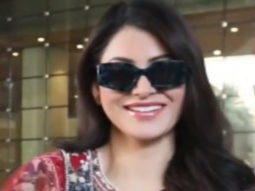 Urvashi Rautela chats with paps at the airport sporting a traditional look