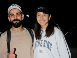 Anushka Sharma and Virat Kohli twin in white as they pose for paps