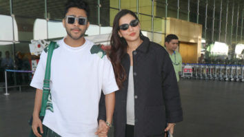 Gauahar Khan & Zaid Darbar walk holding hands at the airport