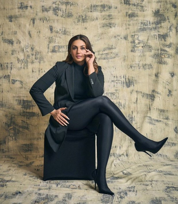 Huma Qureshi showcases layering ideas for winter in a black turtleneck top, skirt, and jacket