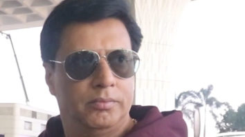 Madhur Bhandarkar greets paps a happy new year as he gets clicked at the airport