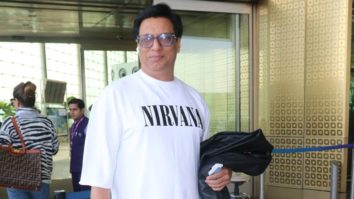 Madhur Bhandarkar poses for paps as he gets clicked with wife at the airport