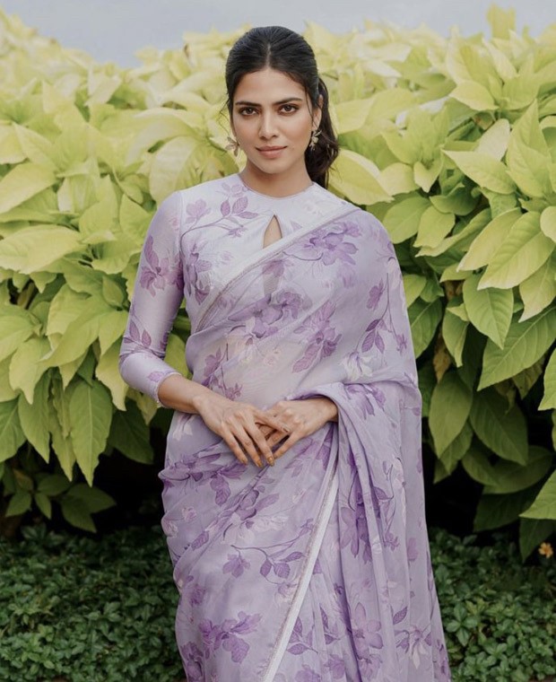 Malavika Mohanan aces spring fashion in beautiful liliac floral saree for Christy promotions