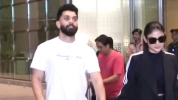 Mouni Roy wishes paps Happy new year as she walks hand in hand with husband