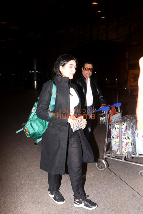 photos govinda and tina ahuja snapped at the airport 1