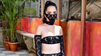 Uorfi Javed poses for paps sporting a black see-through dress