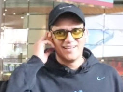 Vijay Verma gets clicked at the airport as he poses with a fan