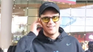 Vijay Verma gets clicked at the airport as he poses with a fan