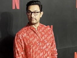 Aamir Khan gets clicked at the Netflix event posing for paps