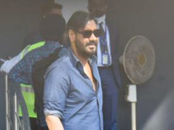 Ajay Devgn looks dashing in a blue shirt as he poses for paps