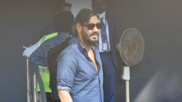 Ajay Devgn looks dashing in a blue shirt as he poses for paps