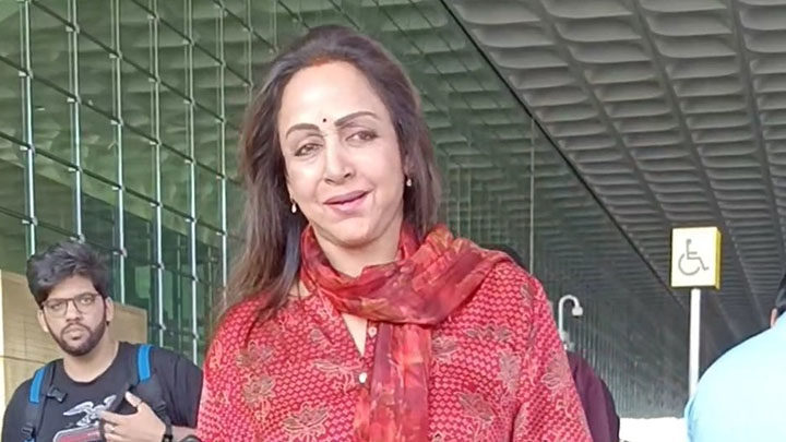 Hema Malini smiles for paps as she gets clicked at the airport