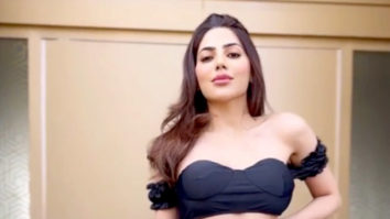 Nikki Tamboli raises the temperature with her cute black crop top and denims