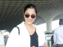 Pooja Hegde poses for paps as she gets clicked at the airport