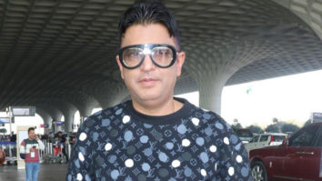 Producer Bhushan Kumar greets paps at the airport