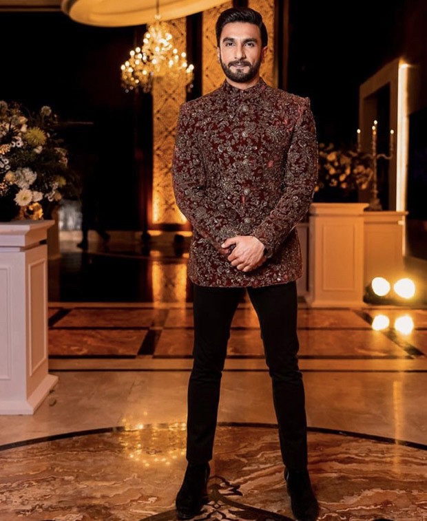 Ranveer Singh blessed our feeds while wearing an outfit by Sabyasachi that included a crimson bandhgala and black velvet pants