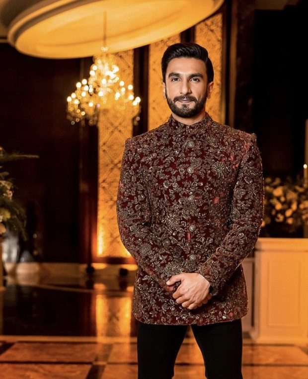Ranveer Singh blessed our feeds while wearing an outfit by Sabyasachi that included a crimson bandhgala and black velvet pants