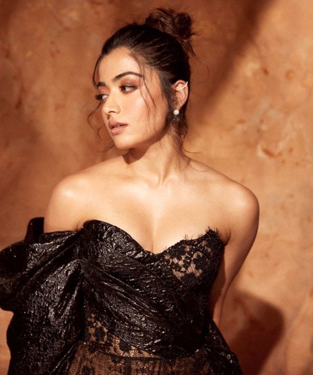 Rashmika Mandanna's black lace mini dress with a flowing train wonderfully encapsulates red carpet fashion 