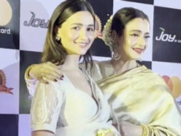 Rekha gifts a Gajra to Alia Bhatt as they get clicked together at an event