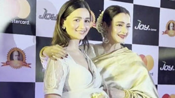 Rekha gifts a Gajra to Alia Bhatt as they get clicked together at an event
