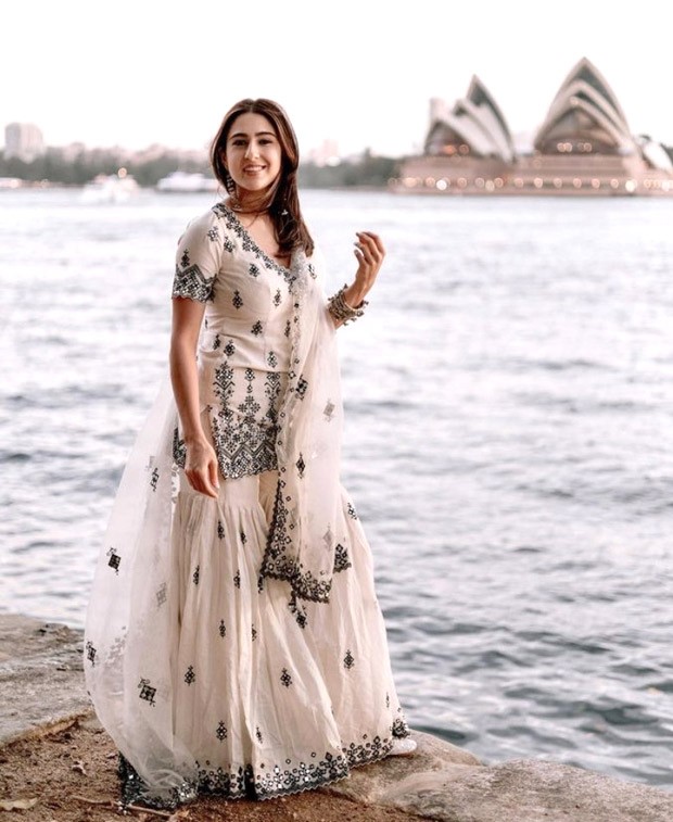 Sara Ali Khan is vying with Sydney's beauty in a white gharara set by Sureena Chowdhri that costs Rs.31K