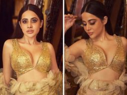 Uorfi Javed is coated in gold as she drapes an extravagant gleaming saree created by the designer duo Abu Jani and Sandeep Khosla
