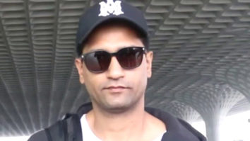 Vicky Kaushal poses for a selfie with a fan at the airport