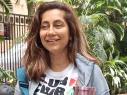 Anusha Dandekar poses for paps on a bike in her gym outfit