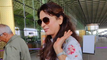 Juhi Chawla & husband Jay Mehta smile for paps at the airport