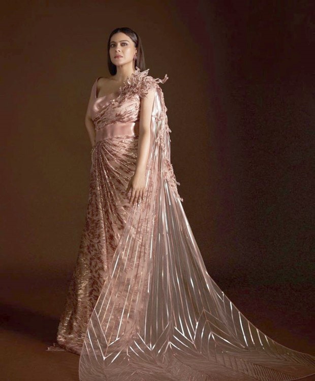 Kajol strikes the ideal balance of glitz and glam in Amit Aggarwal's pastel pink metallic saree