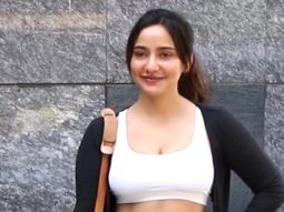Neha Sharma flaunts her toned midriff as she poses outside her gym