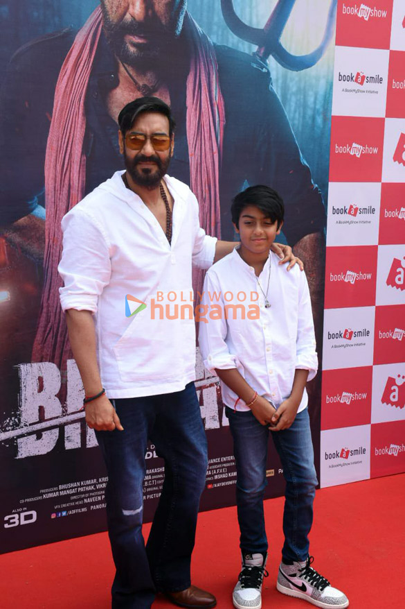 photos ajay devgn and snapped with his son at a screening of bholaa 5
