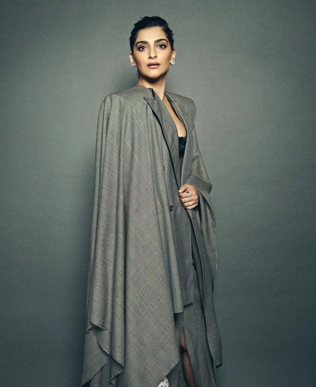 Sonam Kapoor bewitches in a grey skirt suit and corset with a pop of colour with yellow Louis Vuitton bag