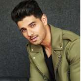 Sooraj Pancholi distributes sweets to the media after getting acquitted in the Jiah Khan suicide case