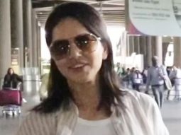 Sunny Leone poses for paps at the airport