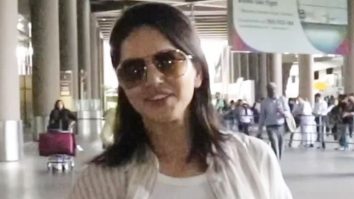 Sunny Leone poses for paps at the airport