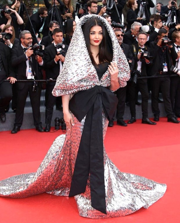 Aishwarya Rai Bachchan in a silver sequin hooded gown with an oversized bow proves why she is the OG of Cannes red carpet