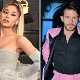 Ariana Grande shares a laugh with Wicked co-star Jonathan Bailey in the leaked photos from the sets