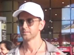 Hrithik Roshan poses with fans as he returns from IIFA