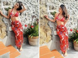 Mouni Roy blooms in her mesmerizing red sarong and bikini, adding a touch of paradise to her vacation style