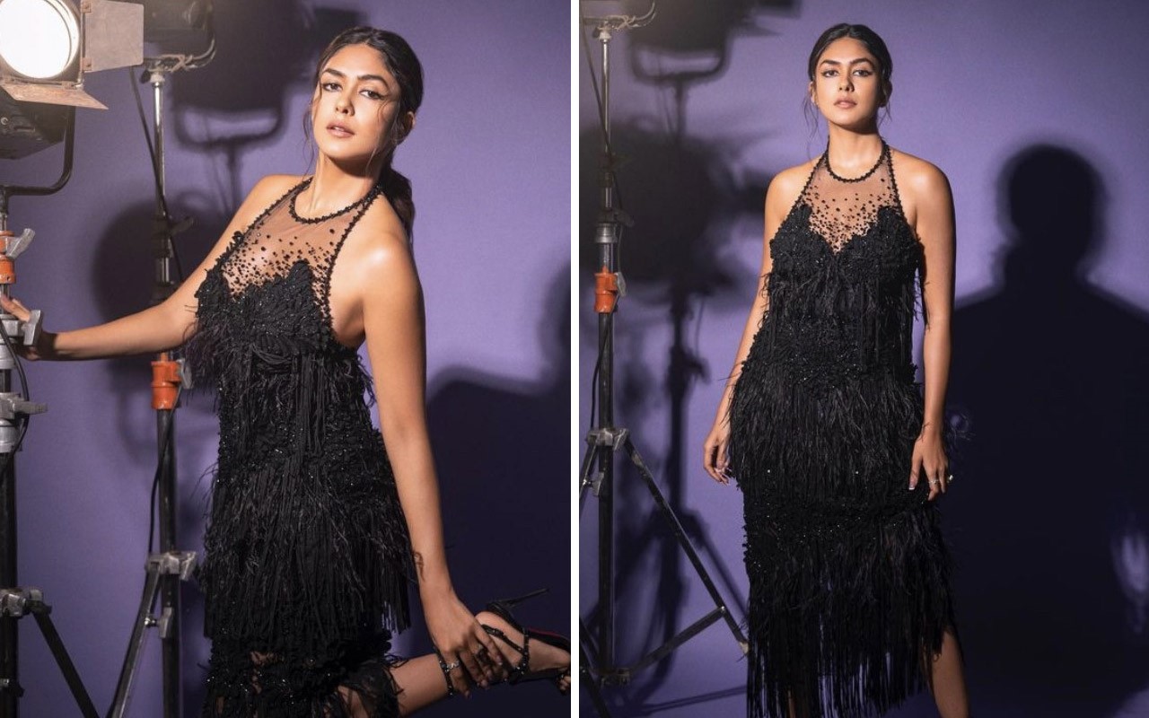 Mrunal Thakur amps up the glamour quotient in a stunning black beaded fringe dress : Bollywood News