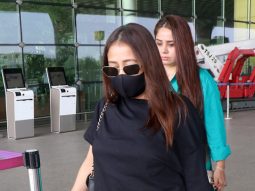 Neha Kakkar’s masked up black & white airport look