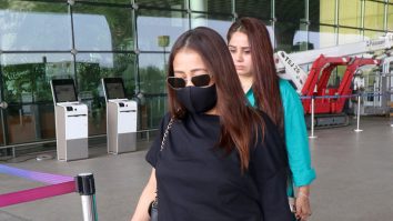 Neha Kakkar’s masked up black & white airport look
