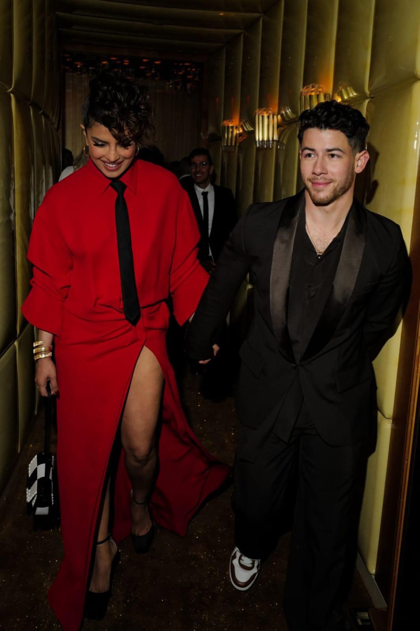 Priyanka Chopra and Nick Jonas make a power couple at the Met Gala after-party; Citadel star dons a fiery Valentino red shirt dress with thigh-high slit