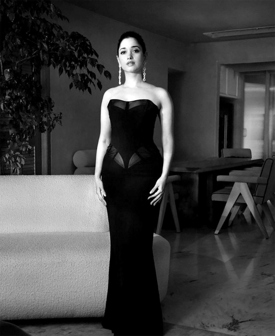 Tamannaah Bhatia sets the red carpet on fire, exuding fierce elegance in her black corset gown by Mugler and H&M